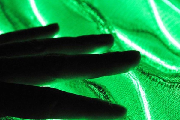 The applications of the new smart fabrics range from the delivery of drugs through the fibers directly into the skin to the regulation of temperature. Credit: Smart Textiles